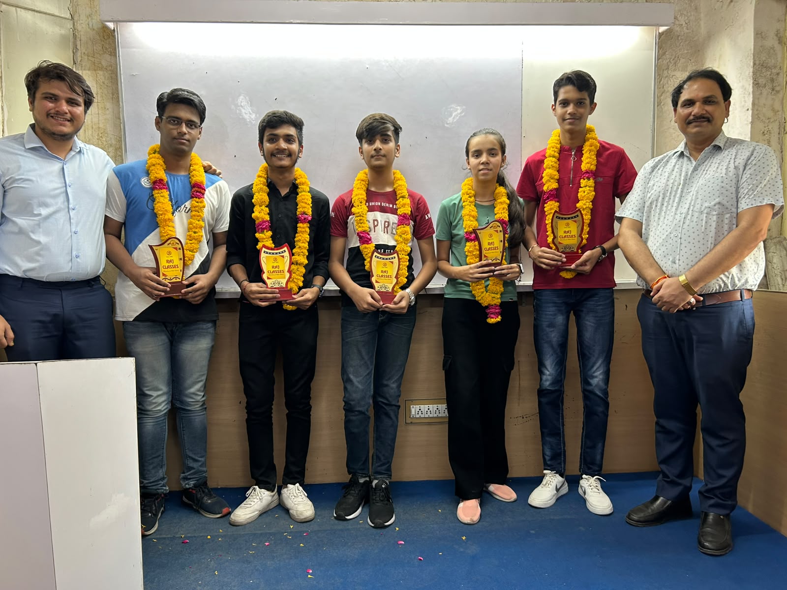 Rohit sir felicitating a topper